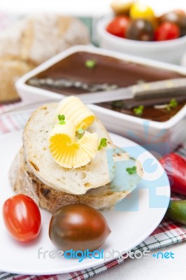 Slices Of Bread And Butter With Tomatoes, Peppers And Pate Stock Photo