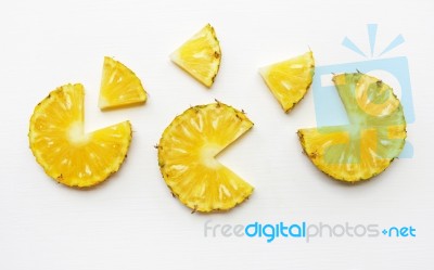 Slices Of Pineapple Isolated On White Stock Photo