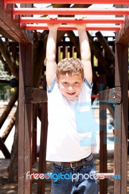 Small Boy Playing Stock Photo