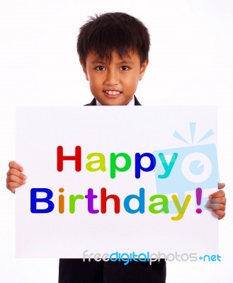 Small Boy With Happy Birthday Board Stock Photo