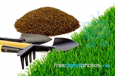 Small Gardening Tools And Artificial Turf Isolated On White Back… Stock Photo