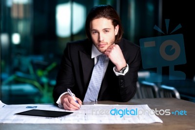 Smart Businessman Projecting His Plans Stock Photo