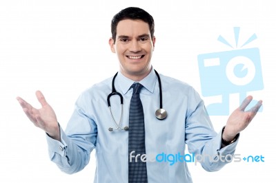 Smart Doctor Standing With Arms Wide Open Stock Photo