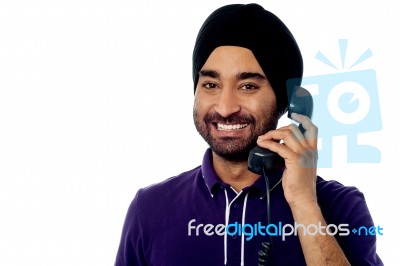 Smart Guy Answering The Phone Call Stock Photo