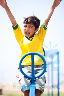 Smart Kid Having Fun, Outdoors Stock Photo