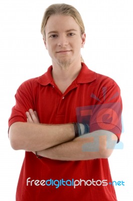 Smart Young Male Posing With Arms Crossed Stock Photo