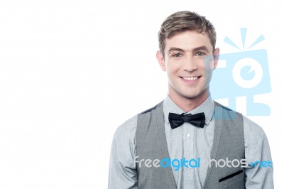 Smart Young Smiling Man With Bowtie Stock Photo