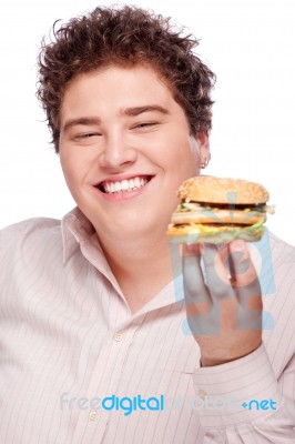 Smiled Chubby And Hamburger Stock Photo