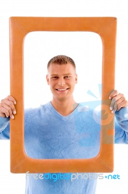 Smiling Adult Man With Frame Stock Photo