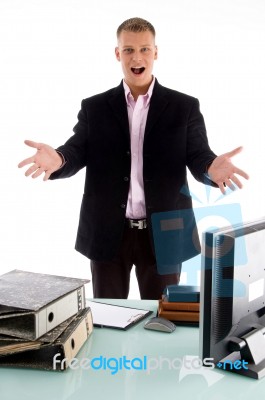 Smiling Boss Showing His Work Table Stock Photo Smiling Boss Showing His Work Table Stock Photo