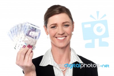 Smiling Business Woman Holding Money Stock Photo