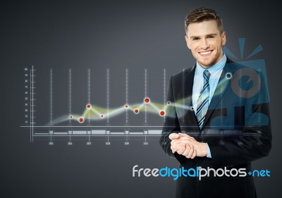 Smiling Businessman And Business Strategy Stock Photo