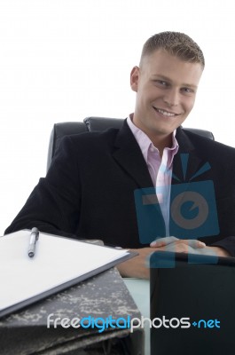 smiling Businessman At Desk Stock Photo