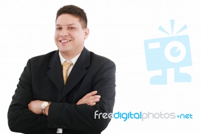 Smiling Businessman Crossing Arm Stock Photo