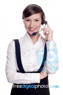 Smiling Call Center Operator In Headset Isolated On White Stock Photo