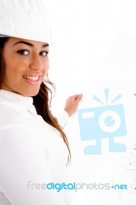 Smiling Cute Female Engineer Holding Blue Prints Stock Photo
