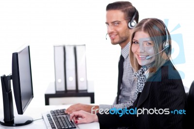 Smiling Executive Operators Stock Photo