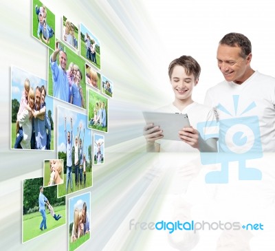 Smiling Father And Son Looking Pictures Stock Photo