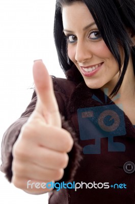 Smiling Female Showing Thumbs Up Stock Photo