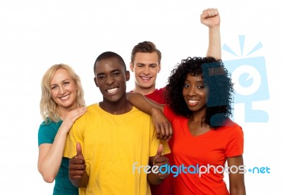 Smiling Friends Showing Thumbs Up Stock Photo