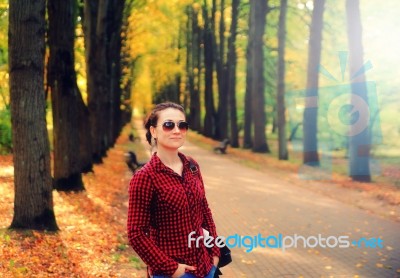 Smiling Girl In Checkered Shir Stock Photo