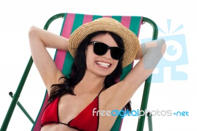Smiling Gorgeous Bikini Model In Dark Shades Stock Photo