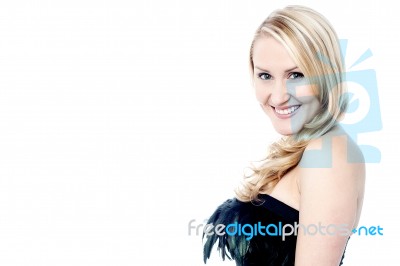 Smiling Gorgeous Woman In Party Dress Stock Photo