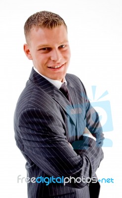 Smiling Male With Crossed Arms Stock Photo