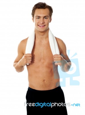 Smiling Man Holding Gym Towel Stock Photo
