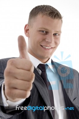 Smiling Manager Showing Thumb Up Stock Photo