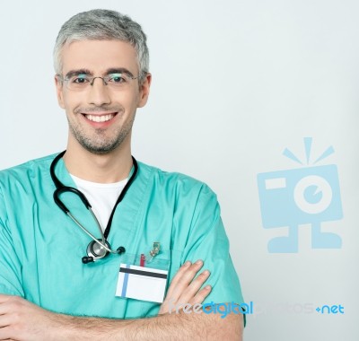 Smiling Middle Aged Physician Stock Photo