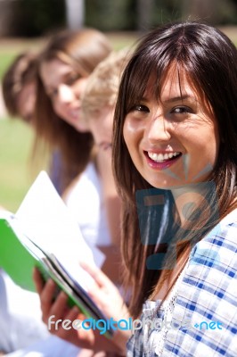 Smiling Modern Female Student In Focus Stock Photo