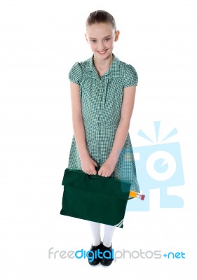 Smiling School Girl Holding Bag Stock Photo