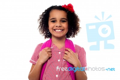 Smiling School Girl With A Backpack Stock Photo