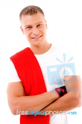 Smiling Spotive Male With Folded Hands Stock Photo