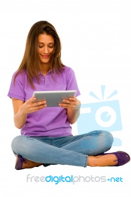 Smiling Teenage Girl Using Ipad Stock Photo