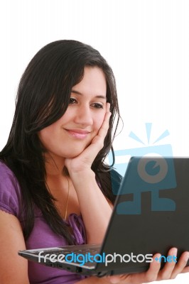 Smiling Woman Holding Laptop Stock Photo