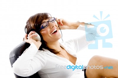 Smiling Woman Listening To Music Stock Photo
