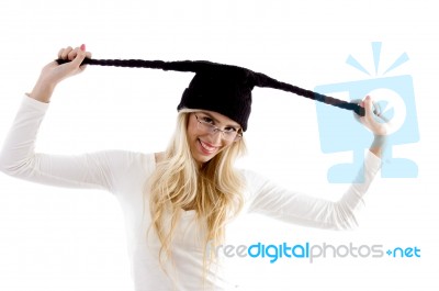 Smiling Woman Wearing Woolen Cap Stock Photo