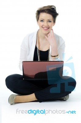 Smiling Woman With Laptop Stock Photo