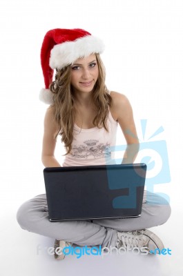 Smiling Young Girl Using Laptop Stock Photo