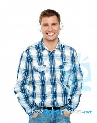 Smiling Young Guy Listening Music Stock Photo