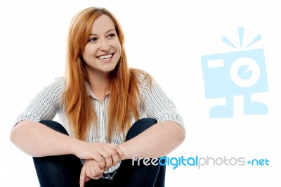 Smiling Young Lady Looking Away Stock Photo