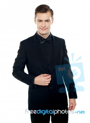 Smiling Young Man Standing Stock Photo