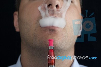 Smoking Electric Cigarettes Stock Photo