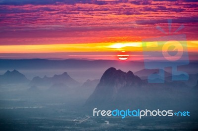 Soft Focus And Blur Beautiful Landscape On The Top Of Mountains With The Sun At Dawn Stock Photo