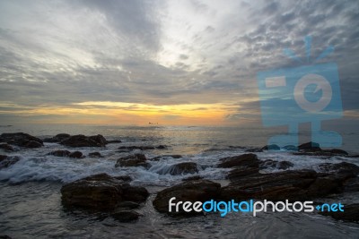 Soft Waves Attract On Rocks Stock Photo