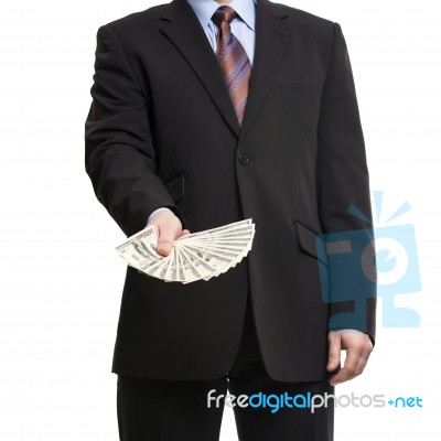 Some Unrecognizable Businessman In Suit Showing  A Spread Of Cas… Stock Photo