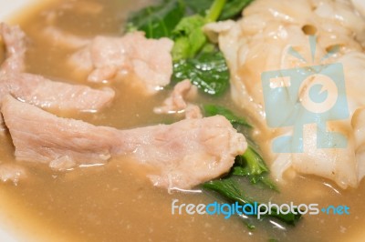 Soup Of Pork With Kale And Pasta In Close Stock Photo