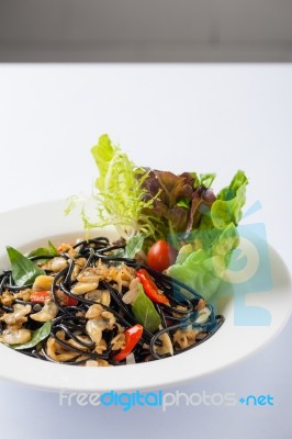 Spicy Black Pasta With Clams Stock Photo